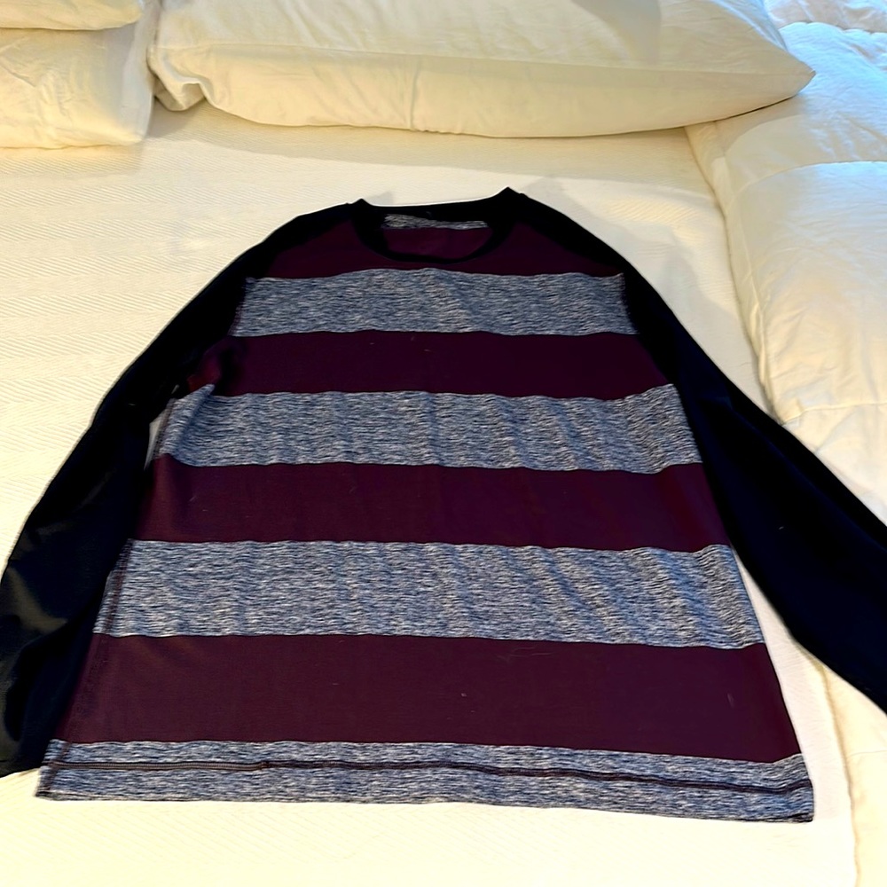 Lululemon long sleeve. Like new! Bought it new and have hardly worn it.